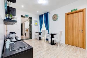 Kuchyň nebo kuchyňský kout v ubytování Ripetta Central Suites