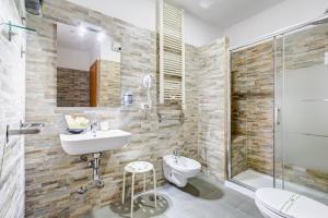 Koupelna v ubytování Ripetta Central Suites