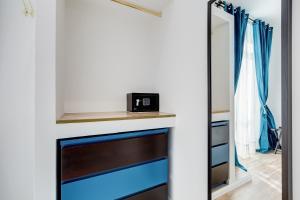 Postel nebo postele na pokoji v ubytování Ripetta Central Suites