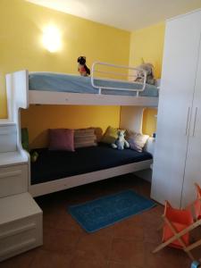 Ένα ή περισσότερα κρεβάτια σε δωμάτιο στο Ariadimare guest house