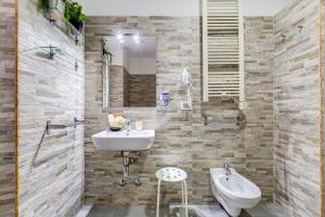 Koupelna v ubytování Ripetta Central Suites