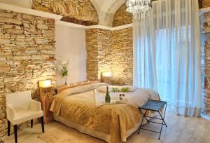 Postel nebo postele na pokoji v ubytování Hotel-Spa Classic Begur