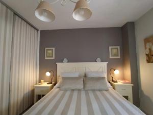 Ένα ή περισσότερα κρεβάτια σε δωμάτιο στο Chalet en Cabezón VUT 47-208