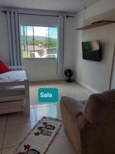 Ένα ή περισσότερα κρεβάτια σε δωμάτιο στο Residencial Di Paoli