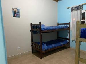 Tempat tidur susun dalam kamar di Casa de Campo Vertientes