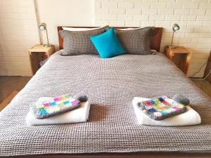 A bed or beds in a room at Base BnB
