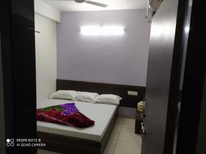 Letto o letti in una camera di Hotel Chouhan Paradise