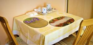 a table with two plates of food on it at soukromý pokoj in Prague