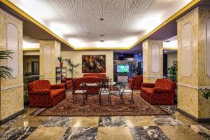 Posezení v ubytování Hotel Grazia Deledda