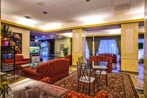 TV a/nebo společenská místnost v ubytování Hotel Grazia Deledda