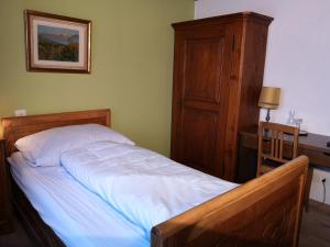 Postel nebo postele na pokoji v ubytování Gasthaus Friedegg