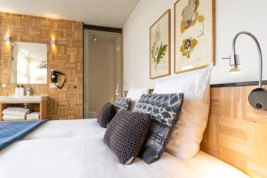 Uma cama ou camas num quarto em Hotel Bleecker