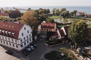 an aerial view of a town with a white building at Kalk Hotel in Visby