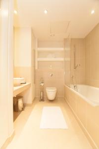 Kylpyhuone majoituspaikassa Horizon Canary Wharf Apartments