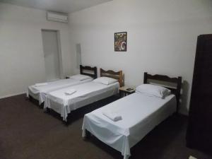 Postel nebo postele na pokoji v ubytování Hotel Mattes
