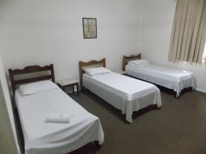 Postel nebo postele na pokoji v ubytování Hotel Mattes