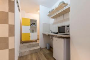 Kuchyň nebo kuchyňský kout v ubytování HVAR CENTRAL APARTMENT