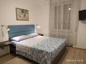 Postel nebo postele na pokoji v ubytování CASA BILO