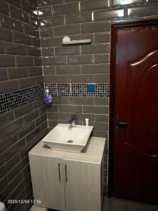 Koupelna v ubytování Aryana Furnished Apartment