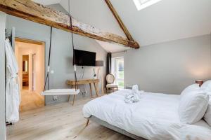 Кровать или кровати в номере Suite & Spa Maison de charmes avec Sauna & Hammam