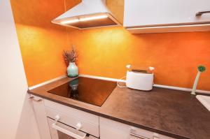 Η κουζίνα ή μικρή κουζίνα στο Sea Sun & Me Apartment +65 φωτογραφίες