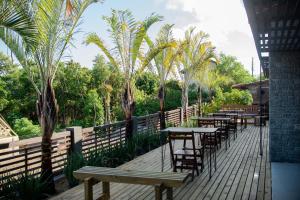 Uma varanda ou terraço em Pousada Cabanas Kaia Lua