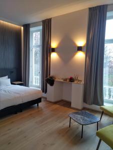 Кровать или кровати в номере Hotel Kronacker