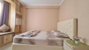 Postel nebo postele na pokoji v ubytování Gateway Pasteur 2 BR tower depan Jade 11 C