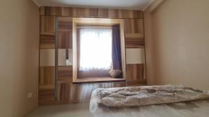 Postel nebo postele na pokoji v ubytování Gateway Pasteur 2 BR tower depan Jade 11 C