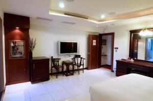 Μια τηλεόραση ή/και κέντρο ψυχαγωγίας στο Kenting Motel