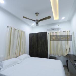 Letto o letti in una camera di R Square Guest inn