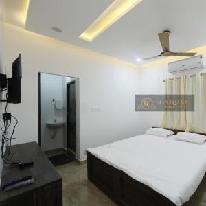 Letto o letti in una camera di R Square Guest inn