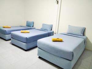 Ozone Chomdao Resort客房内的一张或多张床位