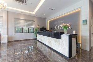 a lobby of a hotel with a reception desk at De Cyber Boutique Hotel in Cyberjaya