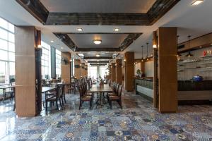Le Erawan Phang Nga Hotel餐厅或其他用餐的地方
