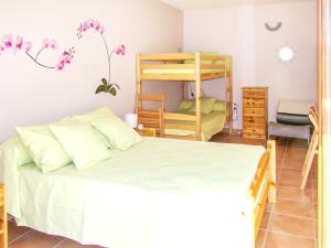 Ένα ή περισσότερα κρεβάτια σε δωμάτιο στο Appartement cosy à Fayet avec vue