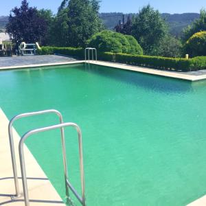 Swimmingpoolen hos eller tæt på 9 bedrooms villa with city view private pool and terrace at Outeiro San Sadurnino de Ferrol Terra