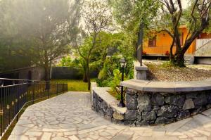 A garden outside Spacious Apartment in Zafferana Etnea 65 m² with Private Garden