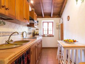 Kuchyň nebo kuchyňský kout v ubytování Cozy house with pool in San Cristóbal de La Laguna, 70 m²