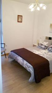 Posteľ alebo postele v izbe v ubytovaní Charming Apartment in Riveira with Private Parking