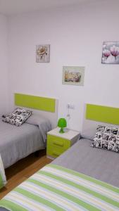 Posteľ alebo postele v izbe v ubytovaní Charming Apartment in Riveira with Private Parking