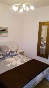 Posteľ alebo postele v izbe v ubytovaní Charming Apartment in Riveira with Private Parking