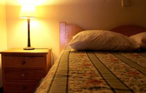 Ένα ή περισσότερα κρεβάτια σε δωμάτιο στο Cosy Apartment Seia 25 m² Fireplace +4 φωτογραφίες