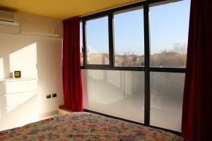 Posteľ alebo postele v izbe v ubytovaní Comfortable Apartment with Sea View in Fano - 60 m².