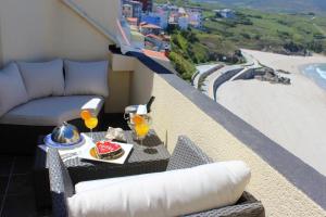 Nápoje v ubytování Elegant Apartment in Malpica with Sea View