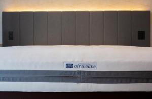 Letto o letti in una camera di Nikko Style Nagoya