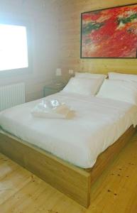 Postel nebo postele na pokoji v ubytování Cozy Chalet in Castell'Arquato 90 m² with Private Pool