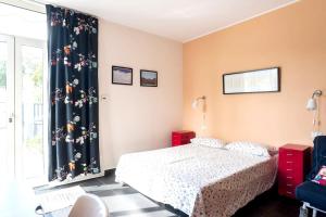 Ένα ή περισσότερα κρεβάτια σε δωμάτιο στο Cozy studio in Nicolosi, 30 m² with included parking
