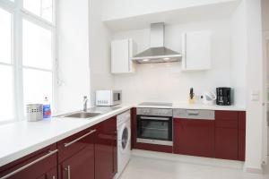 Kuchyňa alebo kuchynka v ubytovaní Vienna-apartment-one Schmidgasse