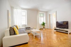 Televízia a/alebo spoločenská miestnosť v ubytovaní Vienna-apartment-one Schmidgasse